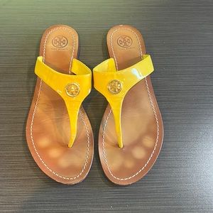 Patent leather yellow Tory Burch flip flops